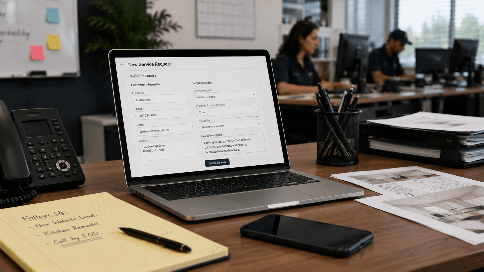 Website service request form on a laptop showing a new home-service lead waiting for follow-up.
